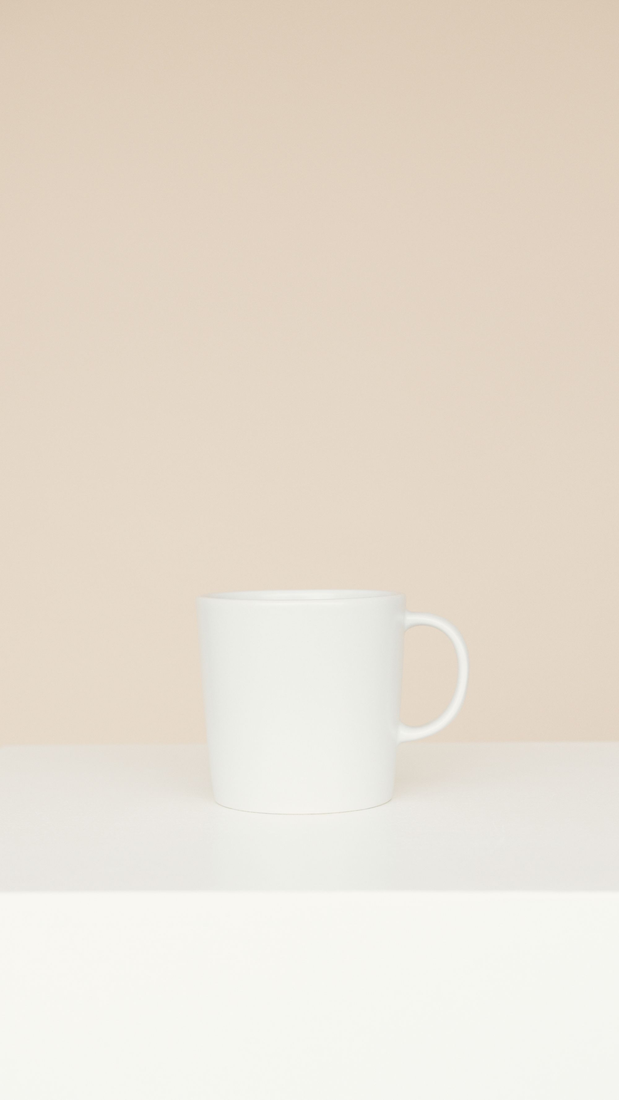 Original photograph of a white mug on a neutral background
